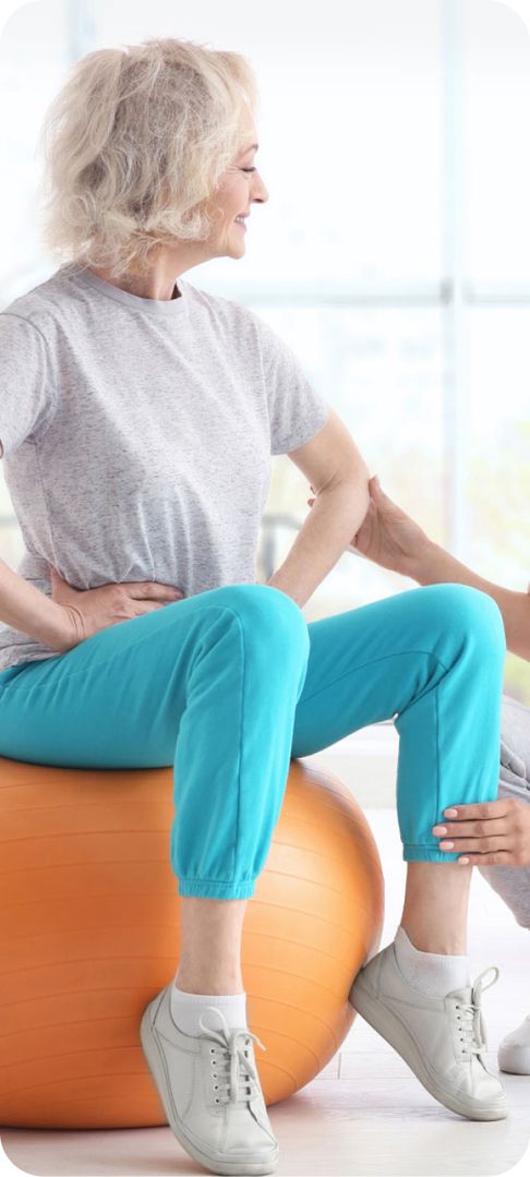 Physiotherapie mit einem Gymnastikball